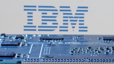 IBM logo is seen near computer motherboard in this illustration. (Reuters)