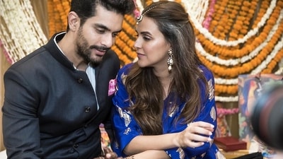 Angad Bedi and Neha Dhupia at their mehendi ceremony. Angad Bedi and Neha Dhupia at their mehendi ceremony.
