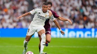 Real Madrid's Kylian Mbappe, left, and Valladolid's Luis Perez challenge for the ball during the Spanish La Liga soccer match between Real Madrid and Valladolid at the Santiago Bernabeu stadium in Madrid, Spain, Sunday, Aug. 25, 2024. (AP Photo/Manu Fernandez) (AP) Real Madrid's Kylian Mbappe, left, and Valladolid's Luis Perez challenge for the ball during the Spanish La Liga soccer match between Real Madrid and Valladolid at the Santiago Bernabeu stadium in Madrid, Spain, Sunday, Aug. 25, 2024. (AP Photo/Manu Fernandez) (AP)