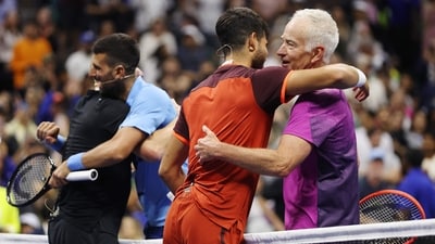 Novak Djokovic, Carlos Alcaraz, John McEnroe, Andre Agassi in an exhibition match. Novak Djokovic, Carlos Alcaraz, John McEnroe, Andre Agassi in an exhibition match.