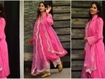 Janhvi Kapoor was spotted in the city looking effortlessly elegant in a simple gulabi suit. Janhvi Kapoor was spotted in the city looking effortlessly elegant in a simple gulabi suit.