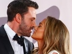 FILE - Jennifer Lopez, right, and Ben Affleck kiss at the premiere of the film "The Last Duel" during the Venice Film Festival in Venice, Italy, on Sept. 10, 2021. (Photo by Joel C Ryan/Invision/AP, File) FILE - Jennifer Lopez, right, and Ben Affleck kiss at the premiere of the film "The Last Duel" during the Venice Film Festival in Venice, Italy, on Sept. 10, 2021. (Photo by Joel C Ryan/Invision/AP, File)