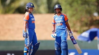 India Women's captain Harmanpreet Kaur and teammate Richa Ghosh celebrate their partnership during the Group A match against United Arab Emirates Women (BCCI- X) India Women's captain Harmanpreet Kaur and teammate Richa Ghosh celebrate their partnership during the Group A match against United Arab Emirates Women (BCCI- X)