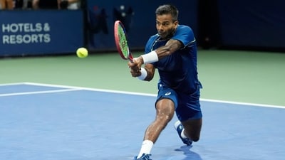 Sumit Nagal, of India, returns a shot to Tallon Griekspoor, of the Netherlands, during a first round match of the U.S. Open (AP) Sumit Nagal, of India, returns a shot to Tallon Griekspoor, of the Netherlands, during a first round match of the U.S. Open (AP)