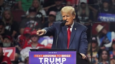 In one of the cards, Donald Trump holds a ball with a Bitcoin logo in his hand, highlighting him as a crypto-friendly presidential candidate. (REUTERS)