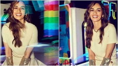Manushi Chhillar's latest look is all kinds of stunning. She dazzled in a white ensemble accessorised with chunky gold jewellery and silver, shimmery elbow-length gloves, radiating pure glam vibes. (Instagram/@manushi_chhillar) Manushi Chhillar's latest look is all kinds of stunning. She dazzled in a white ensemble accessorised with chunky gold jewellery and silver, shimmery elbow-length gloves, radiating pure glam vibes. (Instagram/@manushi_chhillar)