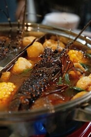 An entire lobster is added to the hotpot as a treat (unsplash) An entire lobster is added to the hotpot as a treat (unsplash)