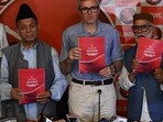 Kashmir, India - August. 19, 2024: National Conference vice president Omar Abdullah and other leaders releasing party manifesto for assembly elections in Srinagar,on 19 August 2024.(Photo By Waseem Andrabi /Hindustan Times)-- 