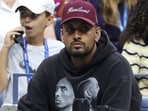 (L) Former tennis player and ESPN commentator Nick Kyrgios looks on during Day Two of the 2024 US Open at the USTA Billie Jean King National Tennis Center on August 27, 2024 in the Flushing neighborhood of the Queens borough of New York City