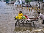 A flooded road in Vadodara on Tuesday after heavy rainfall caused waterlogging in the city (PTI Photo) A flooded road in Vadodara on Tuesday after heavy rainfall caused waterlogging in the city (PTI Photo)