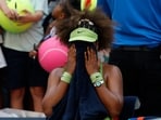 Naomi Osaka (JPN) reacts in her player's chair after her match against Jelena Ostapenko (LAT)(not pictured) in a women's singles match on day two of the 2024 U.S. Open tennis tournament