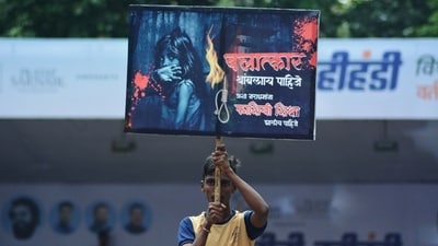 Thane, India - August 27, 2024: Govinda is seen holding a placard calling for death sentence for the accused in the Badlapur girls sexual assault case at the Dahi Handi festival in Thane at Sanskruti yuva Pratishan Dahihandi vartak nager in Thane. ( Praful Gangurde /HT Photo )