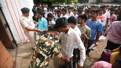 Mobile phones, Bluetooth, WiFi gadgets, electronic pens, pagers, and watches were not permitted inside the exam hall. (Photo by Santosh Kumar) Mobile phones, Bluetooth, WiFi gadgets, electronic pens, pagers, and watches were not permitted inside the exam hall. (Photo by Santosh Kumar)