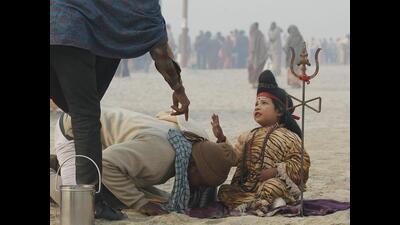 A child dressed as Lord Shiva at the bank of Sangam ahead of Mahakumbh (File) A child dressed as Lord Shiva at the bank of Sangam ahead of Mahakumbh (File)