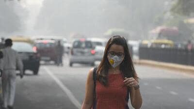 A woman wears a mask to shield herself from rising pollutants during winter, when pollution peaks in Delhi. (HT Archive) A woman wears a mask to shield herself from rising pollutants during winter, when pollution peaks in Delhi. (HT Archive)