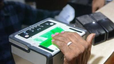 An Indian woman gets her biometric scans done during the registration process for Aadhaar cards. (AFP File Photo) An Indian woman gets her biometric scans done during the registration process for Aadhaar cards. (AFP File Photo)
