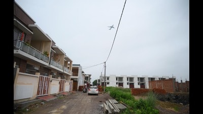 Around 50 houses are situated alarmingly close within 500 metres of the airport’s boundary wall (Deepak Gupta/HT) Around 50 houses are situated alarmingly close within 500 metres of the airport’s boundary wall (Deepak Gupta/HT)