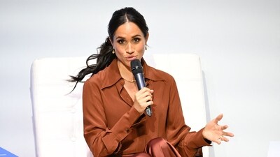 Meghan Markle and Prince Harry are “very demanding” and “difficult to work for” since they put “a lot of people's backs up," according to an insider. (AFP)