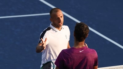 Daniel Evans of Great Britain shakes hands with Karen Khachanov of Russia after winning in five sets during their Men's Singles First Round match on Day Two of the 2024 US Open (Getty Images via AFP) Daniel Evans of Great Britain shakes hands with Karen Khachanov of Russia after winning in five sets during their Men's Singles First Round match on Day Two of the 2024 US Open (Getty Images via AFP)