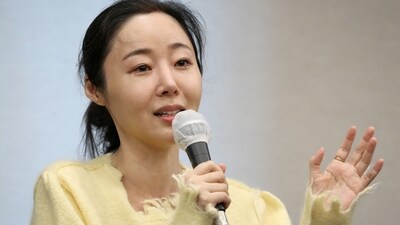 Min Hee-jin will stay on board as an ADOR staff member.