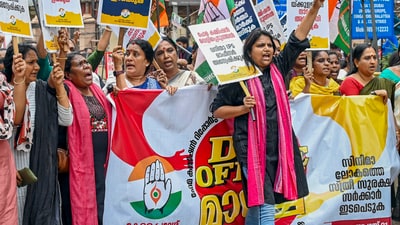 Mahila Congress activists stage a protest after several Malayalam film industry actresses come forward with sexual harassment allegations (PTI Photo) (PTI)