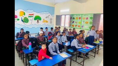 Students during a class at one of the newly constructed classrooms at Government Primary School, Kadiana Kalan, in Ludhiana on Wednesday. (HT Photo)