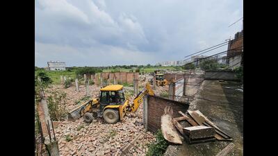 The administration on Wednesday demolished 48 shops and two offices in Shahberi, said officials. (HT Photo)