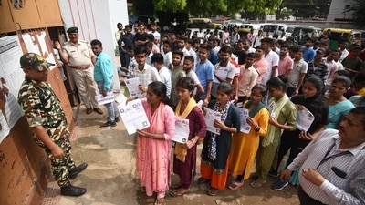 Candidates were allowed to enter the exam hall from 10:30 a.m. onwards (1.5 hours before the starting time) and were allowed to exit only after the OMR sheets were sealed at the end of the examination. (Photo by Santosh Kumar) Candidates were allowed to enter the exam hall from 10:30 a.m. onwards (1.5 hours before the starting time) and were allowed to exit only after the OMR sheets were sealed at the end of the examination. (Photo by Santosh Kumar)