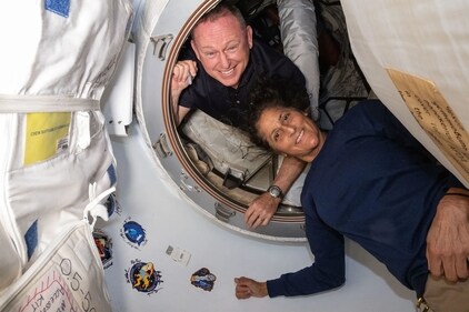 This undated handout picture from Nasa released on July 2, 2024 shows NASA�s Boeing Crew Flight Test astronauts (from top) Butch Wilmore and Suni Williams inside the vestibule between the forward port on the International Space Station�s Harmony module and Boeing's Starliner spacecraft. (AFP) This undated handout picture from Nasa released on July 2, 2024 shows NASA�s Boeing Crew Flight Test astronauts (from top) Butch Wilmore and Suni Williams inside the vestibule between the forward port on the International Space Station�s Harmony module and Boeing's Starliner spacecraft. (AFP)
