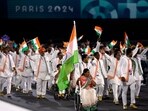 Flagbearers Bhagyashri Mahavrao Jadhav of India and Sumit of India lead their contingent during the Opening Ceremony for the 2024 Paralympics.