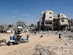 Palestinians who retuned briefly to eastern Deir al-Balah in the central Gaza Strip to check on property, carry away some items they were able to salvage amid the devastation, after Israeli troops pulled out from some blocks in the area on August 29, 2024, amid the ongoing conflict between Israel and the Hamas militant group. Palestinians who retuned briefly to eastern Deir al-Balah in the central Gaza Strip to check on property, carry away some items they were able to salvage amid the devastation, after Israeli troops pulled out from some blocks in the area on August 29, 2024, amid the ongoing conflict between Israel and the Hamas militant group.