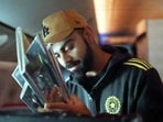 Virat Kohli holds the T20 World Cup trophy inside the charter flight to New Delhi Virat Kohli holds the T20 World Cup trophy inside the charter flight to New Delhi