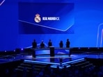Real Madrid are shown on the screen during the draw