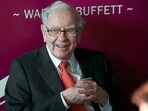 Warren Buffett, chairman and CEO of Berkshire Hathaway, smiles as he plays bridge following the annual Berkshire Hathaway shareholders meeting in Omaha, Neb., May 5, 2019. (Nati Harnik/AP)