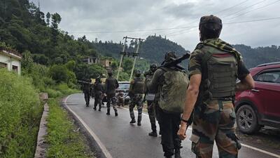 Army patrols the encounter site, in Lathi village, Rajouri, on Thursday. (PTI)