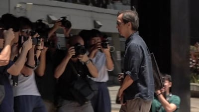 Chung Pui-kuen (R), the former chief editor of Hong Kong's now shuttered pro-democracy news outlet Stand News, was convicted of sedition in court (Photo by Daniel LEE and Grace WAI / AFPTV / AFP) (AFP) Chung Pui-kuen (R), the former chief editor of Hong Kong's now shuttered pro-democracy news outlet Stand News, was convicted of sedition in court (Photo by Daniel LEE and Grace WAI / AFPTV / AFP) (AFP)