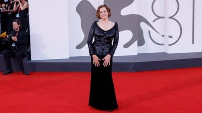 Sigourney Weaver won the Lifetime Achievement Award at the Venice Film Festival. For the special occasion, she wore a black sequinned gown with a wide neckline, fitted silhouette, and a flared skirt. (Vianney Le Caer/Invision/AP) Sigourney Weaver won the Lifetime Achievement Award at the Venice Film Festival. For the special occasion, she wore a black sequinned gown with a wide neckline, fitted silhouette, and a flared skirt. (Vianney Le Caer/Invision/AP)