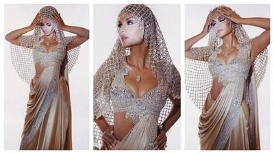 Natasha Poonawalla donned a divine silver saree, dazzling like a true diva. Her blouse with a v-neckline featured intricate embroidery. The highlight of her ensemble was the silver headgear that featured dangling crystals. She embodied the essence of a dazzling diamond. (Instagram/@natasha.poonawalla) Natasha Poonawalla donned a divine silver saree, dazzling like a true diva. Her blouse with a v-neckline featured intricate embroidery. The highlight of her ensemble was the silver headgear that featured dangling crystals. She embodied the essence of a dazzling diamond. (Instagram/@natasha.poonawalla)