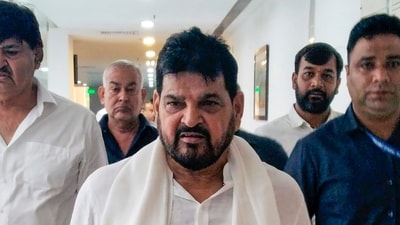 Former Wrestling Federation of India (WFI) chief and BJP leader Brij Bhushan Sharan Singh arrives to appear before the Rouse Avenue Court. (PTI file photo)