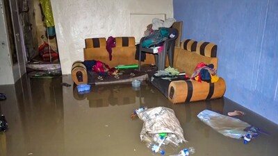 A room in a house is partially submerged as floodwaters enter homes in low-lying areas of Vadodara, Gujarat, on Thursday. (PTI) A room in a house is partially submerged as floodwaters enter homes in low-lying areas of Vadodara, Gujarat, on Thursday. (PTI)