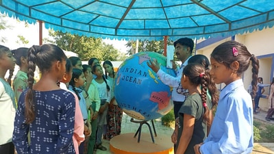 Pankaj Kumar Goyal, a social sciences teacher at the Government Senior Secondary School (GSSS) for Girls, Barnala, with his students. He has been selected for the National Teachers’ Award, 2024, for his efforts to transform educational prospects of underprivileged students. (HT Photo)