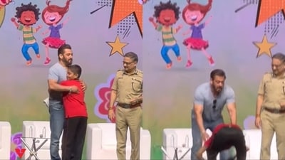 Salman Khan with a young fan at Mumbai event. Salman Khan with a young fan at Mumbai event.
