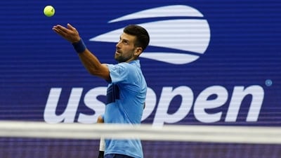 Novak Djokovic (SRB) serves against Laslo Djere (SRB)(not pictured) in a men's singles match on day three of the U.S. Open (USA TODAY Sports via Reuters Con)