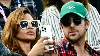 US actress Eva Mendes (L) and her partner Canadian actor Ryan Gosling (R) attend the artistic gymnastics women's uneven bars final during the Paris 2024 Olympic Games at the Bercy Arena in Paris, on August 4, 2024. (AFP) US actress Eva Mendes (L) and her partner Canadian actor Ryan Gosling (R) attend the artistic gymnastics women's uneven bars final during the Paris 2024 Olympic Games at the Bercy Arena in Paris, on August 4, 2024. (AFP)