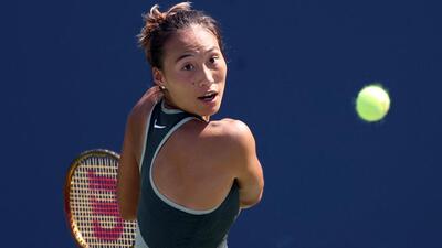 Zheng Qinwen of China returns a shot against Erika Andreeva of Russia during their second round match. (Getty Images via AFP) Zheng Qinwen of China returns a shot against Erika Andreeva of Russia during their second round match. (Getty Images via AFP)