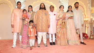 Mukesh Ambani, Akash Ambani, Shloka Ambani, Anand Piramal and Isha Ambani are seen.