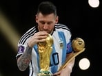 Lionel Messi kisses the World Cup after winning 2022 FIFA World Cup, Qatar. Lionel Messi kisses the World Cup after winning 2022 FIFA World Cup, Qatar.