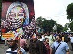 Junior doctors take part in a protest rally against the alleged sexual assault and murder of a postgraduate trainee doctor at R G Kar Medical College and Hospital, in Kolkata. (PTI)