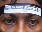 A Congress activist during a protest rally against the alleged rape and murder of a trainee woman doctor at RG Kar Medical College and Hospital in Kolkata. 