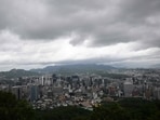 A general view shows the city skyline after heavy rain as seen from the landmark Namsan Tower in central Seoul on July 17, 2024. (Jung Yeon-je/AFP)